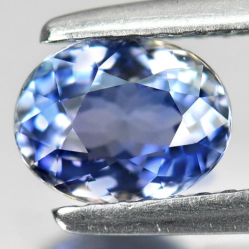 Natural Violetish Blue Tanzanite Gemstones 1.12 Ct. Oval Shape 6.90 x 5.39 Mm.: Product ID: 807005286 Product Name: Natural Tanzanite Weight: 1.12 CT. Size: 6.90 x 5.39 x 3.89 MM. Shape: Oval Color: Purple Clarity:VVS Luster: Good Gems Origin: Tanzania Treatment: Heated Crystal S