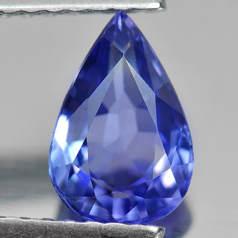 Natural Blue Tanzanite Gemstones 1.05 Ct. Clean Pear Shape 8.2 x 5.4 Mm.: Product ID: 807006035 Product Name: Natural Tanzanite Weight: 1.05 CT. Size: 8.2 x 5.4 x 3.5 MM. Shape: Pear Color: Violetish Blue Clarity:IF Luster: Very Good Gems Origin: Tanzania Treatment: Heated 