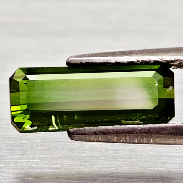 Natural Green Tourmaline Gemstones 1.35 Ct. Octagon Shape 10.6 x 4.2 Mm.: Product ID: 807250928 Product Name: Natural Tourmaline Weight: 1.35 CT. Size: 10.6 x 4.2 x 3 MM. Shape: Octagon Color: Green Clarity:VVS - VSI Luster: Very Good Gems Origin: Nigeria Treatment: Unheate