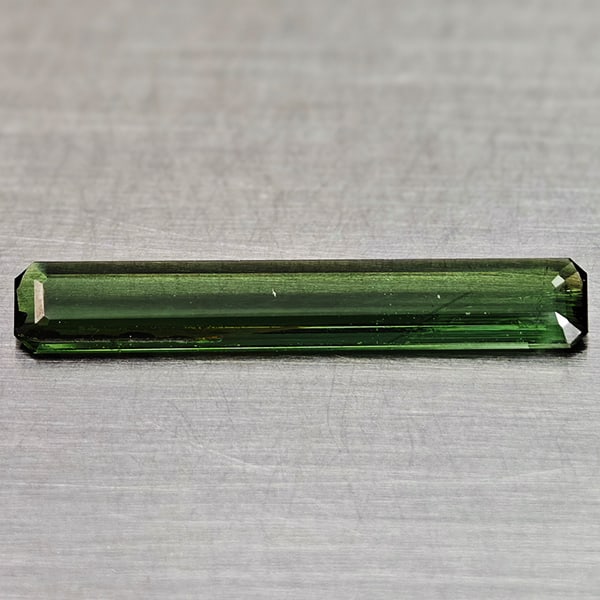 Natural Green Tourmaline Gemstones 1.22 Ct. Ocatgon Shape 20.3 x 3.5 Mm.: Product ID: 807250845 Product Name: Natural Tourmaline Weight: 1.22 CT. Size: 20.3 x 3.5 x 1.7 MM. Shape: Octagon Color: Green Clarity:VVS Luster: Good Gems Origin: Nigeria Treatment: Unheated Crystal