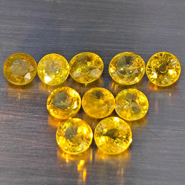 Natural Greenish Yellow Titanium Sphene Gemstones Rainbow Spark 3.51 Ct. 10 Pcs. Round Shape 4 Mm.: Product ID: 806509334 Product Name: Natural Sphene Weight: 3.51 CT. Size: 4 x 4 x 2.3 MM. Shape: Round Shape Color: Greenish Yellow Titanium Ranibow Spark Clarity:SI1 Luster: Good Gems Origin: Madagas