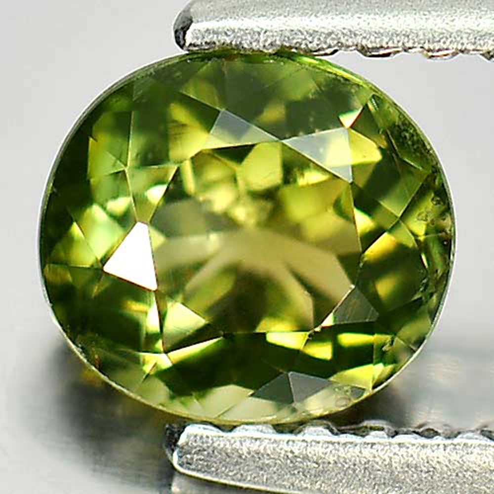 Natural Green Tourmaline Gemstones 0.78 Ct. Oval Shape 5.8 x 5.3 Mm.: Product ID: 807246290 Product Name: Natural Tourmaline Weight: 0.78 CT. Size: 5.8 x 5.3 x 3.8 MM. Shape: Oval Color: Green Clarity:VSI Luster: Very Good Gems Origin: Nigeria Treatment: Unheated Crysta