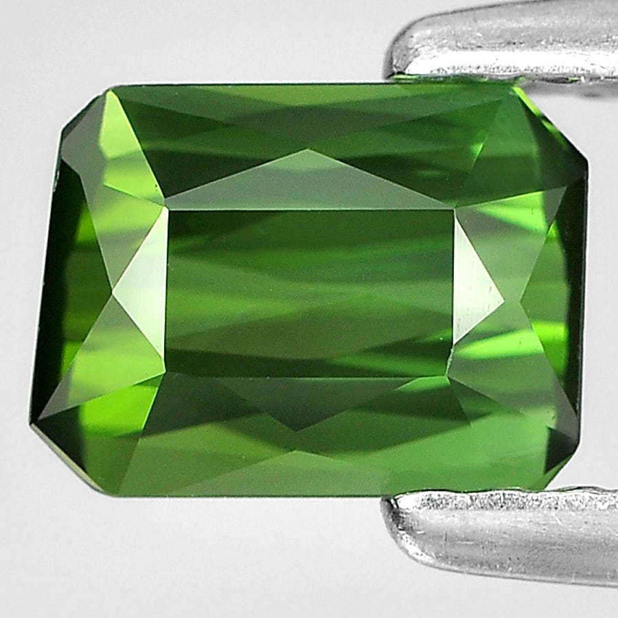 Natural Green Tourmaline Gemstones 0.87 Ct. Clean Octagon Shape 6.4 x 4.8 Mm.: Product ID: 807224271 Product Name: Natural Tourmaline Weight: 0.87 CT. Size: 6.4 x 4.8 x3.5 MM. Shape: Octagon Color: Green Clarity:IF Luster: Good Gems Origin: Nigeria Treatment: Unheated Crystal St