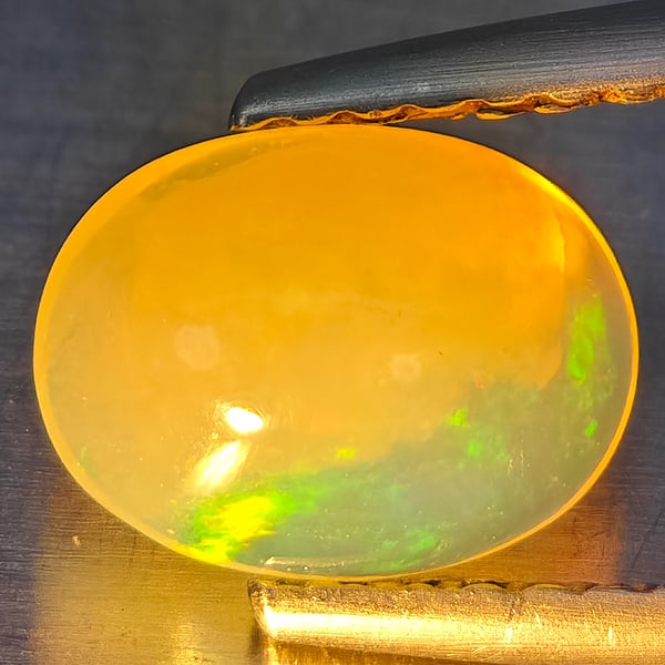 Natural Multi-Color Opal Gemstones 1.10 Ct. Oval Cabochon Shape 8 x 6 Mm.: Product ID: 818728298 Product Name: Natural Opal Weight: 1.10 CT. Size: 8 x 6 x 4 MM. Shape: Oval Cabochon Color: Multi-Color Clarity:None Luster: Good Gems Origin: Ethiopia Treatment: Unheated Crysta