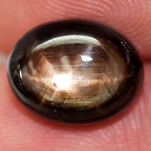 Natural Black Star Sapphire Gemstones 6 Rays 5.71 Ct. Oval Cabochon Shape 10.8 x 8.6 Mm.: Product ID: 806130350 Product Name: Natural Star Sapphire Weight: 5.71 CT. Size: 10.8 x 8.6 x 5.1 MM. Shape: Oval Cabochon Color: Black Clarity:Opaque Luster: Good 6 Rays Star Gems Origin: Thailand Tr