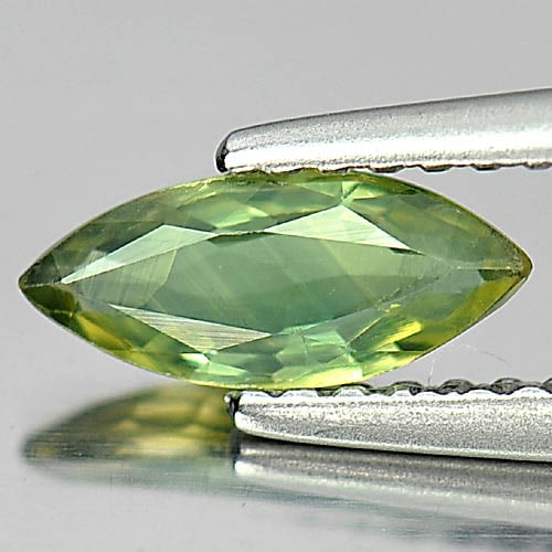 Natural Yellowish Green Sapphire Gemstones 0.63 Ct. Marquise Shape 8.6 x 3.7 Mm.: Product ID: 806158887 Product Name: Natural Green Sapphire Weight: 0.63 CT. Size: 8.6 x 3.7 x 2.2 MM. Shape: Marquise Color: Yellowish Green Clarity:VSI Luster: Good Gems Origin: Thailand Treatment: H