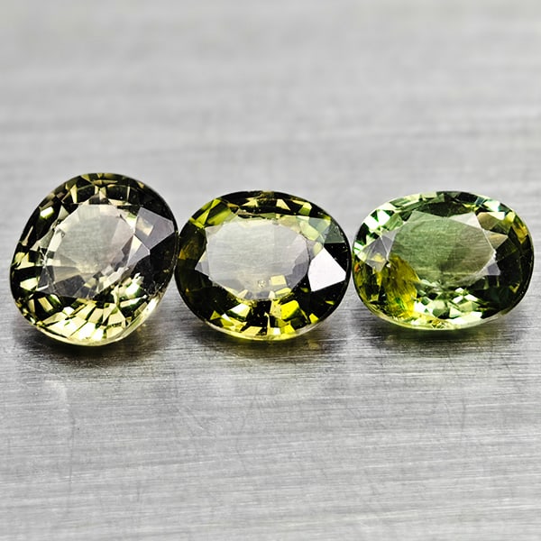 Natural Green Tourmaline Gemstones 1.51 Ct. 3 Pcs. Oval Shape and Mixed Size: Product ID: 807250819 Product Name: Natural Tourmaline Weight: 1.51 CT. Size: 5.3 x 4.5 x 2.8 to 5.3 x 4.7 x 3.3 MM. Shape: Oval Color: Green Clarity:VSI Luster: Good Gems Origin: Nigeria Treatment: U