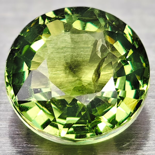 Natural Green Apatite Tanzania Gemstones 0.89 Ct. Round Shape 5.8 Mm.: Product ID: 100602600 Product Name: Natural Apatite Weight: 0.89 CT. Size: 5.8 X 5.8 X 3.5 MM. Shape: Round Color: Green Clarity:Si Luster: Good Gems Origin: Tanzania Treatment: Unheated Crystal Struc