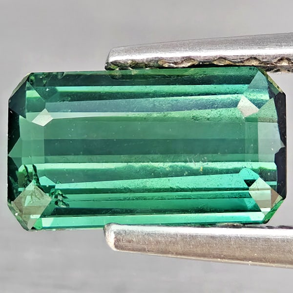 Natural Green Tourmaline Gemstones 0.89 Ct. Octagon Shape 7.6 x 4.4 Mm.: Product ID: 807251089 Product Name: Natural Tourmaline Weight: 0.89 CT. Size: 7.6 x 4.4 x 2.8 MM. Shape: Octagon Color: Green Clarity:SI1 Luster: Good Gems Origin: Nigeria Treatment: Unheated Crystal 