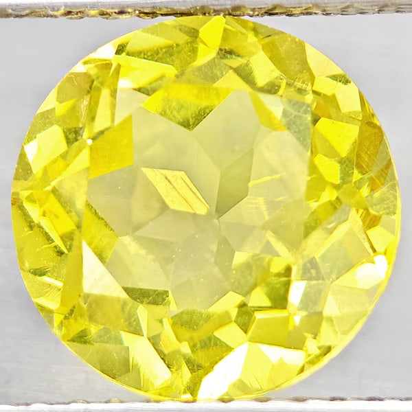 Natural Yellow Lemon Quartz Gemstones 2.71 Ct. Round Shape 9.1 Mm.: Product ID: 805530177 Product Name: Natural Quartz Weight: 2.71 CT. Size: 9.1 x 9.1 x 5.9 MM. Shape: Round Color: Yellow Lemon Clarity:VSI Luster: Good Gems Origin: Brazil Treatment: Unheated Crystal 