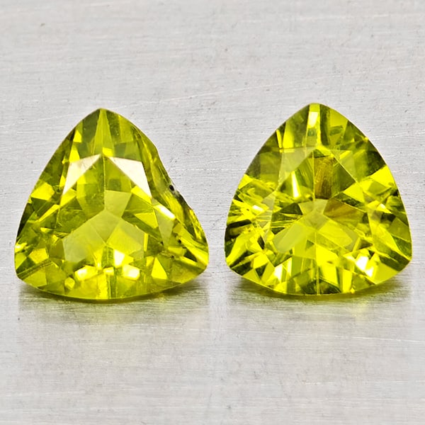 Natural Green Peridot Gemstones 1.93 Ct. 2 Pcs. Trilliant Shape 6 Mm.: Product ID: 805317528 Product Name: Natural Peridot Weight: 1.93 CT. Size: 6 x 6 x 4.5 MM. Shape: Trilliant Color: Green Clarity:SI1 Luster: Good Gems Origin: Pakistan Treatment: Unheated Crystal Stru