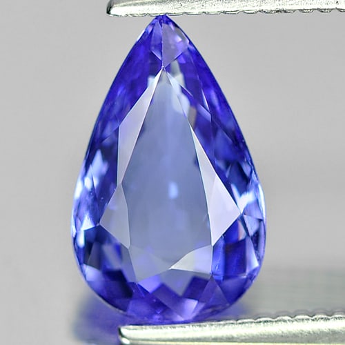 Natural Blue Tanzanite Gemstones 1.56 Ct. Pear Shape 10.1 x 6.3 Mm.: Product ID: 807006097 Product Name: Natural Tanzanite Weight: 1.56 CT. Size: 10.1 x 6.3 x 3.6 MM. Shape: Pear Color: Violetish Blue Clarity:VSI Luster: Good Gems Origin: Tanzania Treatment: Heated Cry