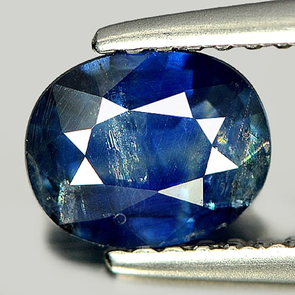 Natural Blue Sapphire Gemstones 1.10 Ct. Oval Shape 7 x 5.7 Mm.: Product ID: 806005608 Product Name: Natural Blue Sapphire Weight: 1.10 CT. Size: 7 x 5.7 x 3 MM. Shape: Oval Color: Blue Clarity:SI Luster: Good Gems Origin: Thailand Treatment: Heated Crystal Structu