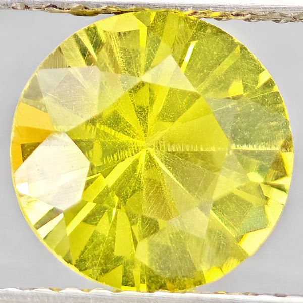 Natural Yellow Lemon Quartz Gemstones 1.81 Ct. Round Diamond Cut 8.2 Mm.: Product ID: 805530130 Product Name: Natural Quartz Weight: 1.81 CT. Size: 8.2 x 8.2 x 5.5 MM. Shape: Round Diamond Cut Color: Yellow Lemon Clarity:VSI Luster: Good Gems Origin: Brazil Treatment: Unhea