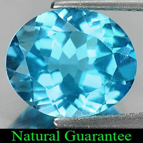 Natural Swiss Blue Topaz Gemstones 5.52 Ct. Oval Shape 12 x 10 Mm.: Product ID: 807161108 Product Name: Natural Blue Topaz Weight: 5.52 CT. Size: 12 x 10 x 6.3 MM. Shape: Oval Color: Swiss Blue Clarity:VSI Luster: Good Gems Origin: Brazil Treatment: Treated Crystal St