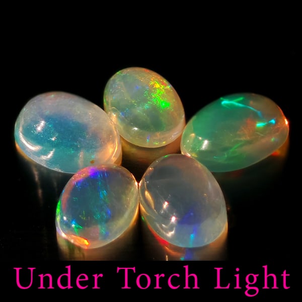Natural Multi Color Opal Gemstones 1.40 Ct. 5 Pcs. Oval Cabochon Shape 6 x 4.1 Mm.: Product ID: 818728088 Product Name: Natural Opal Weight: 1.40 CT. Size: 6 x 4.1 x 2.5 MM. Shape: Oval Cabochon Color: Multi-Color Clarity:Semi - Transparent Luster: Good Gems Origin: Ethiopia Treatmen