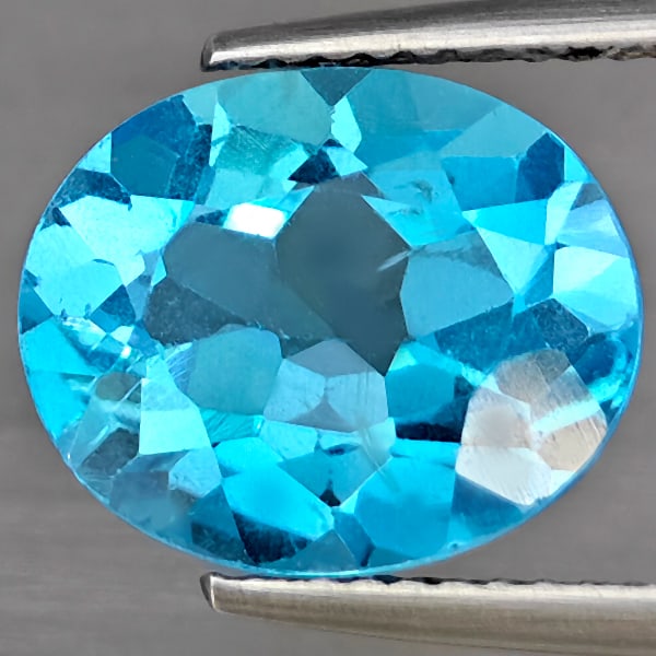 Natural Swiss Blue Topaz Gemstones 5.59 Ct. Oval Shape 12.2 x 10 Mm. (1 of 3)
