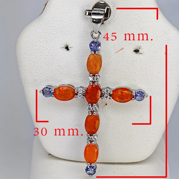 Natural Fire Opal & Tanzanite with 925 Sterling Silver Pendant Jewelry 3.10 Grams: Product ID: 808500464 Product Type: 925 Sterling Silver Fine Jewelry Jewelry Weight: 3.10 Grams. Gemstones Color: Multi-Color Orange Metal: Solid Silver 92.5%. Gemstone Detail: Opal At Your Service: A