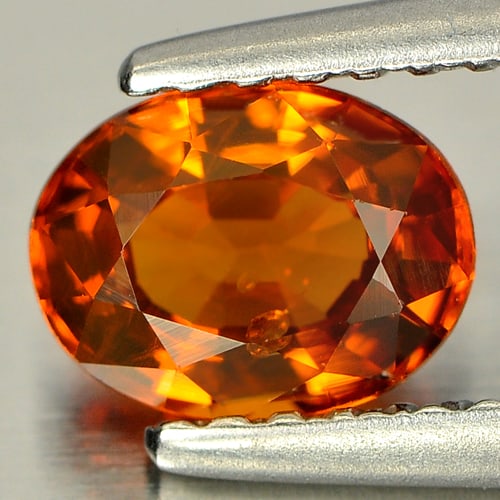 Natural Orange Spessartine Garnet Gemstones 0.91 Ct. Oval Shape 6.6 x 5 Mm: Product ID: 802921366 Product Name: Natural Spessartine Weight: 0.91 CT. Size: 6.6 x 5 x 3.4 MM. Shape: Oval Color: Orange Clarity:SI Luster: Good Gems Origin: Nigeria Treatment: Unheated Crystal Stru