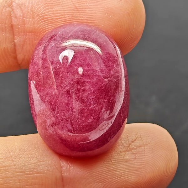 Natural Pink Red Ruby Gemstone 40.23 Ct. Oval Cabochon Shape 21 x 16 Mm.: Product ID: 805935312 Product Name: Natural Ruby Weight: 40.23 CT. Size: 21 x 16 x 10.3 MM. Shape: Oval Cabochon Color: Purplish Red Clarity:Opaque Luster: Good Gems Origin: Madagascar Treatment: Heat