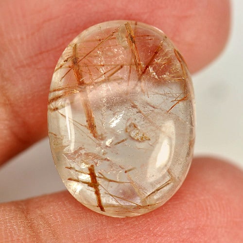 Natural Rutilated Quartz Gemstones 13.88 Ct. Oval Cabochon Shape 18.8 x 14.2 Mm.: Product ID: 805524646 Product Name: Natural Quartz Weight: 13.88 CT. Size: 18.8 x 14.2 x 6.7 MM. Shape: Oval Cabochon Color: White Brown Clarity:Semi - Transparent Luster: Good Gems Origin: Thailand T