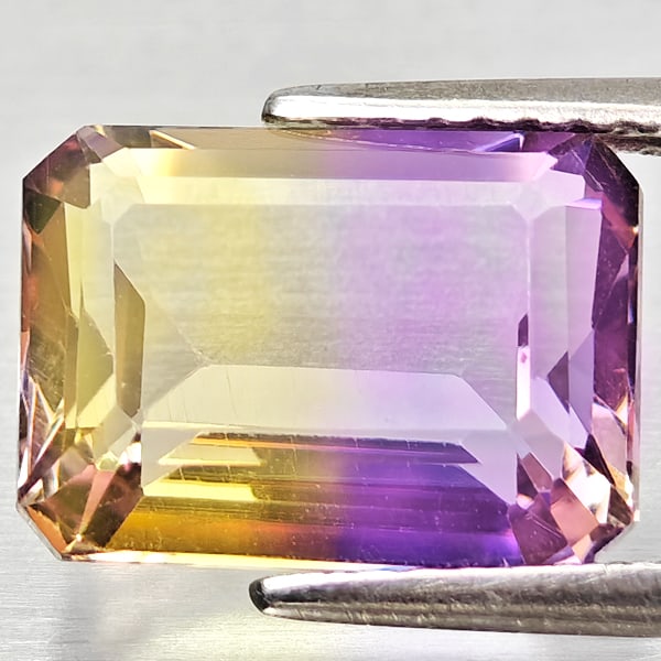 Natural Bi Color Ametrine Gemstones 3.93 Ct. Octagon Shape 11.2 x 8.3 Mm.: Product ID: 800408314 Product Name: Natural Ametrine Weight: 3.93 CT. Size: 11.2 x 8.3 x 5.3 MM. Shape: Octagon Color: Bi Color Clarity:VSI Luster: Good Gems Origin: Bolivia Treatment: Unheated Crysta