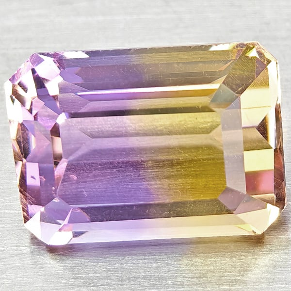 Natural Bi Color Ametrine Gemstones 2.45 Ct. Octagon Shape 9.3 x 6.6 Mm.: Product ID: 800408459 Product Name: Natural Ametrine Weight: 2.45 CT. Size: 9.3 x 6.6 x 5.4 MM. Shape: Octagon Color: Bi Color Clarity:VSI Luster: Good Gems Origin: Bolivia Treatment: Unheated Crystal