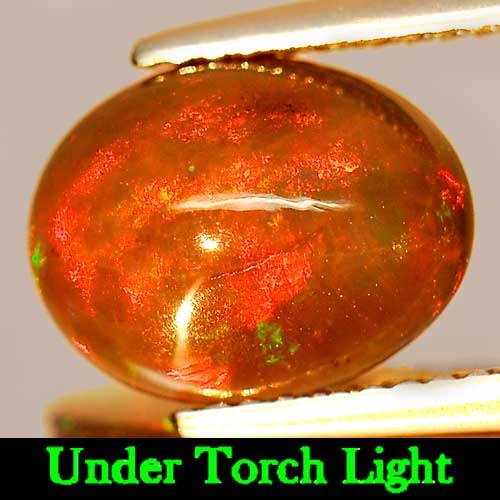 Natural Fire Red Black Opal Gemstones 1.60 Ct. Oval Cabochon Shape 10.9 x 8.4 Mm.: Product ID: 818725840 Product Name: Natural Opal Weight: 1.60 CT. Size: 10.9 x 8.4 x 4.2 MM. Shape: Oval Cabochon Color: Multi-Color Clarity:Semi - Transparent Luster: Iridescent Gems Origin: Ethiopia