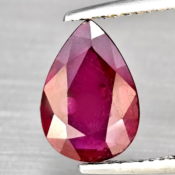 Natural Red Ruby Gemstones 3.34 Ct. Pear Shape 11.8 x 8.3 Mm.: Product ID: 805929451 Product Name: Natural Ruby Weight: 3.34 CT. Size: 11.8 x 8.3 x 4 MM. Shape: Pear Color: Purplish Red Clarity:SI Luster: Good Gems Origin: Madagascar Treatment: Heated (Lead-glass