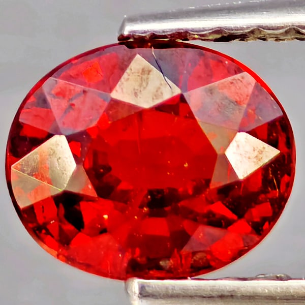 Natural Orangish Red Spessartine Garnet Gemstones 1.28 Ct. Oval Shape 6.8 x 5.6 Mm.: Product ID: 802937298 Product Name: Natural Garnet Weight: 1.28 CT. Size: 6.8 x 5.6 x 3.5 MM. Shape: Oval Shape Color: Orangish Red Clarity:SI1 Luster: Good Gems Origin: Namibia Treatment: Unheated Cr