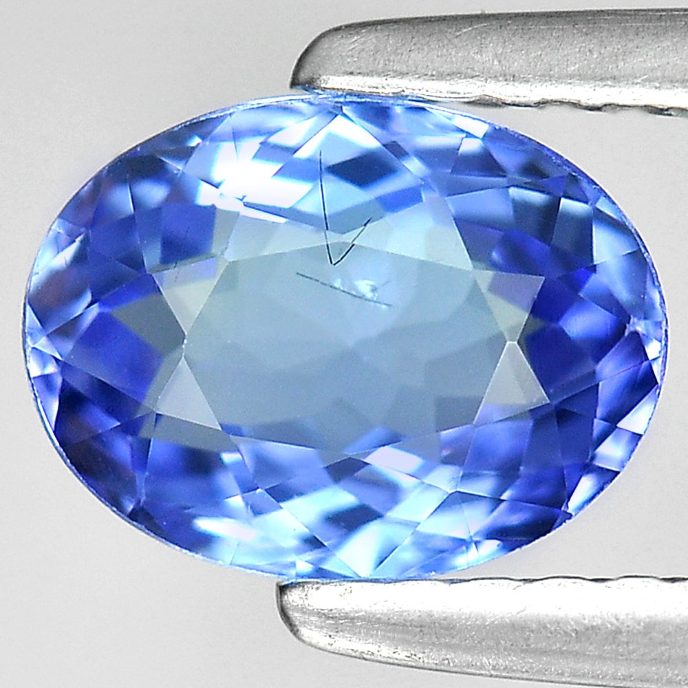 Natural Blue Tanzanite Gemstones 1.09 Ct. Oval Shape 7.5 x 5.6 Mm.: Product ID: 807006535 Product Name: Natural Tanzanite Weight: 1.09 CT. Size: 7.5 x 5.6 x 3.4 MM. Shape: Oval Color: Blue Clarity:VVS Luster: Good Gems Origin: Tanzania Treatment: Heated Crystal Struct
