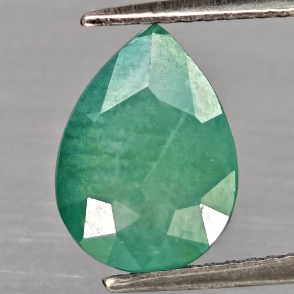 Natural Green Blueish Grandidierite Gemstones 2.99 Ct. Pear Shape 10.3 x 7.8 Mm.: Product ID: 803100058 Product Name: Natural Tsavorite Weight: 2.99 CT. Size: 10.3 x 7.8 x 5.6 MM. Shape: Pear Color: Green Blueish Clarity:SI1 Luster: Good Gems Origin: Madagascar Treatment: Unheated 