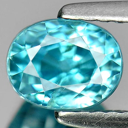 Natural Blue Zircon Gemstones 1.73 Ct. Oval Shape 6.5 x 5 Mm.: Product ID: 807726971 Product Name: Natural Zircon Weight: 1.73 CT. Size: 6.5 x 5 x 4.8 MM. Shape: Oval Color: Blue Clarity:SI Luster: Good Gems Origin: Cambodia Treatment: Heated Crystal Structure: T