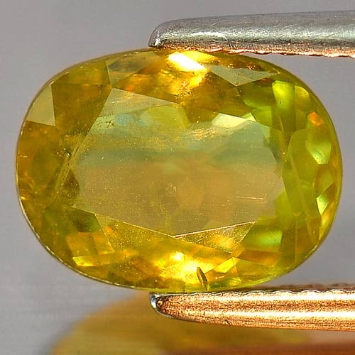 Natural Multi Color Sphene Gemstones Red Spark 2.54 Ct. Oval Shape 10.3 x 7.7 Mm.: Product ID: 806503318 Product Name: Natural Sphene Weight: 2.54 CT. Size: 10.3 x 7.7 x 3.7 MM. Shape: Oval Color: Multi Color With Red Spark Clarity:SI1 Luster: Adamantine Gems Origin: Mardagascar Tre