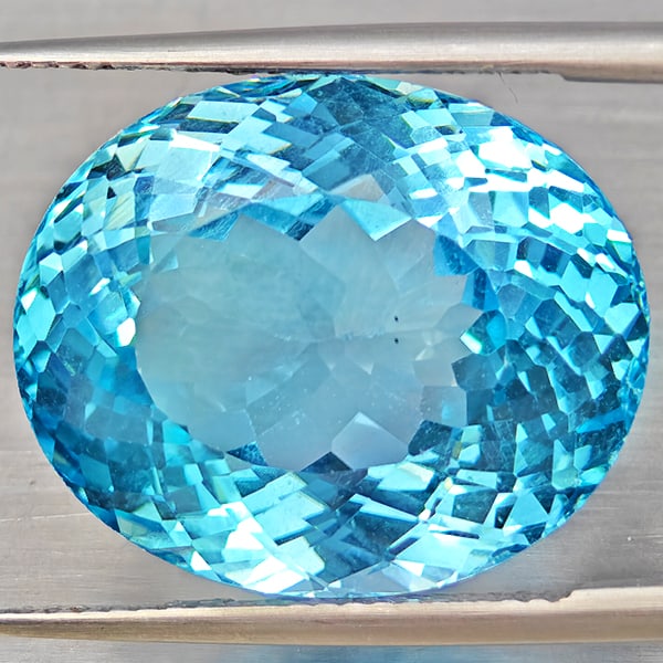 Natural Baby Blue Topaz Gemstones 27.45 Ct. Oval Shape 19 x 15.7 Mm.: Product ID: 807168514 Product Name: Natural Blue Topaz Weight: 27.45 CT. Size: 19 x 15.7 x 11.4 MM. Shape: Oval Shape Color: Baby Blue Color Clarity:VVS Luster: Very Good Gems Origin: Brazil Treatment