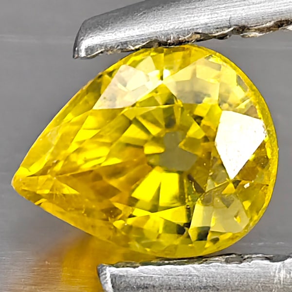 Natural Yellow Songea Sapphire Gemstones 0.56 Ct. Pear Shape 5 x 4.2 Mm.: Product ID: 806163015 Product Name: Natural Yellow Sapphire Weight: 0.56 CT. Size: 5 x 4.2 x 3.5 MM. Shape: Pear Shape Color: Yellow Clarity:VSI Luster: Good Gems Origin: Tanzania Treatment: Heated Cr
