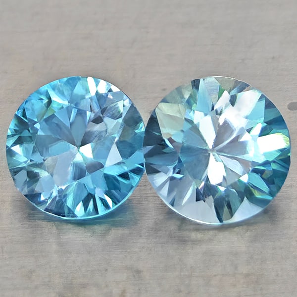 Natural Blue Zircon Gemstones 1.32 Ct. 2 Pcs. Round Diamond Cut 5.1 Mm.: Product ID: 807743037 Product Name: Natural Zircon Weight: 1.32 CT. Size: 5.1 x 5.1 x 3.4 MM. Shape: Round Diamond Cut Color: Blue Clarity:VSI Luster: Very Good Gems Origin: Cambodia Treatment: Heated