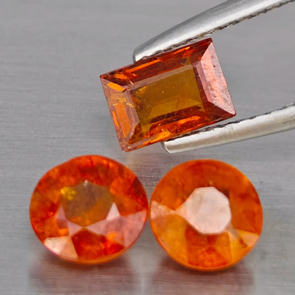 Natural Orangish Red Spessartine Garnet Gemstones 3.62 Ct. 3 Pcs. Mixed Shape: Product ID: 802937928 Product Name: Natural Garnet Weight: 3.62 CT. Size: 6.8 x 4.6 x 3.3 to 6.2 x 6.2 x 3.8 MM. Shape: Mixed Shape Color: Orangish Red Clarity:SI1 Luster: Good Gems Origin: Namibia Tr