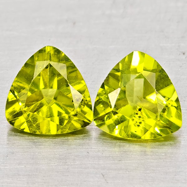 Natural Green Peridot Gemstones 1.76 Ct. 2 Pcs. Trilliant Shape 6 Mm.: Product ID: 805317519 Product Name: Natural Peridot Weight: 1.76 CT. Size: 6 x 6 x 4 MM. Shape: Trilliant Color: Green Clarity:SI1 Luster: Good Gems Origin: Pakistan Treatment: Unheated Crystal Struct