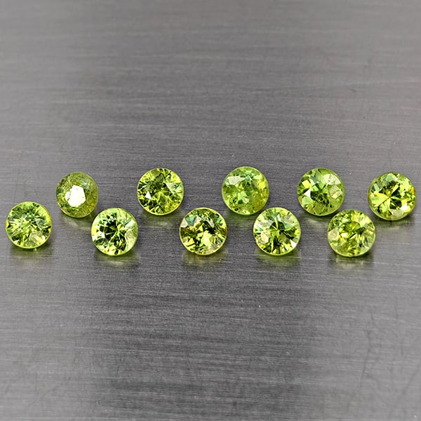 Natural Green Demantiod Garnet Gemstones 2.36 Ct. 10 Pcs. Round Diamond Cut 3.3 Mm.: Product ID: 802937693 Product Name: Natural Demantoid Weight: 2.36 CT. Size: 3.3 x 3.3 x 2.5 MM. Shape: Round Diamond Cut Color: Green Clarity:SI1 Luster: Good Gems Origin: Madagascar Treatment: Unhea