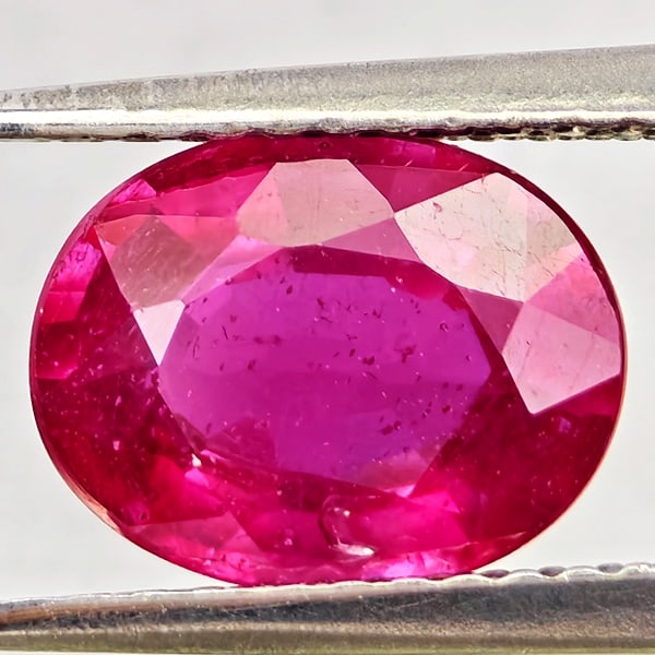 Natural Purplish Red Ruby Gemstones 2.27 Ct. Oval Shape 9 x 7.1 Mm.: Product ID: 805935664 Product Name: Natural Ruby Weight: 2.27 CT. Size: 9 x 7.1 x 4 MM. Shape: Oval Color: Purplish Red Clarity:VSI Luster: Good Gems Origin: Madagascar Treatment: Heated (Lead-glass f