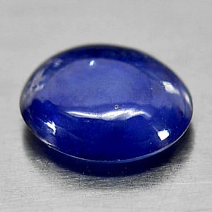 Natural Blue Sapphire Gemstones 0.91 Ct. Oval Cabochon Shape 6.5 x 5.8 Mm.: Product ID: 806009114 Product Name: Natural Blue Sapphire Weight: 0.91 CT. Size: 6.5 x 5.8 x 2.3 MM. Shape: Oval Cabochon Color: Blue Clarity:Opaque Luster: Good Gems Origin: Ceylon Treatment: Heated 