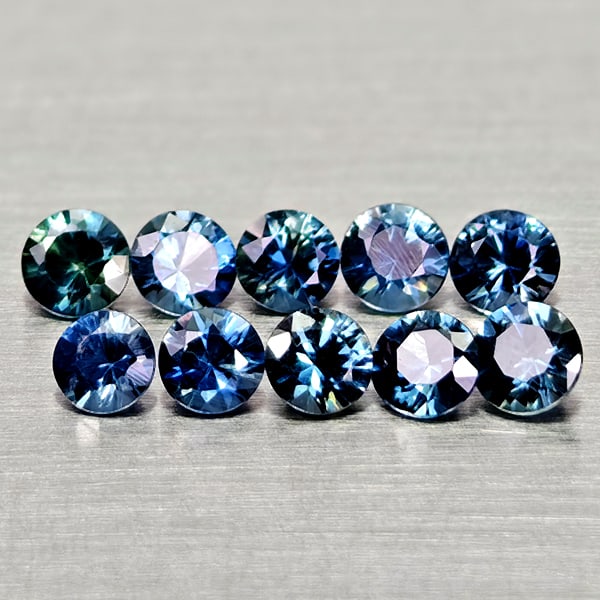 Natural Multi Color Sapphire Gemstones 0.84 Ct.10 Pcs. Round Diamand Cut 2.6 to 1.7 Mm.: Product ID: 806162188 Product Name: Natural Green Sapphire Weight: 0.84 CT. Size: 2.6 x 2.6 x 1.7 to 2.5 x 2.5 x 1.7 MM. Shape: Round Diamond Cut Color: Blue Green Clarity:VSI Luster: Very Good Gems O