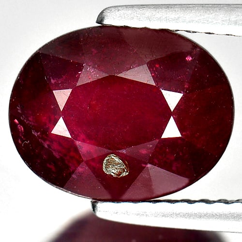 Natural Purplish Red Ruby Gemstones 4.60 Ct. Oval Shape 10.4 x 8.2 Mm.: Product ID: 805927194 Product Name: Natural Ruby Weight: 4.60 CT. Size: 10.4 x 8.2 x 5.5 MM. Shape: Oval Color: Red Clarity:SI1 Luster: Good Gems Origin: Mardagascar Treatment: Heated Lead-glass filli