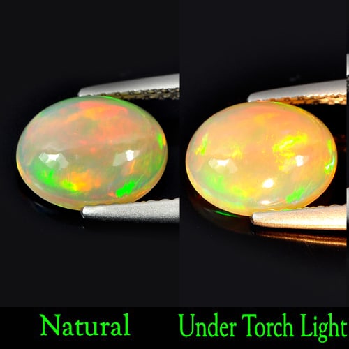 Natural Multi Color Opal Gamstones 1.20 Ct. Oval Cabochon Shape 9.1 x 7.2 Mm.: Product ID: 818727056 Product Name: Natural Opal Weight: 1.20 CT. Size: 9.1 x 7.2 x 3.8 MM. Shape: Oval Cabochon Color: Multi Color Clarity:Semi - Transparent Luster: Iridescent Gems Origin: Ethiopia 