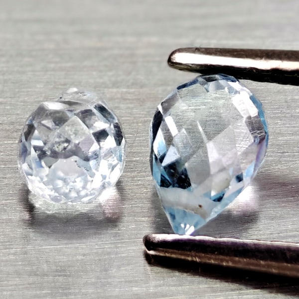 Natural Sky Blue Topaz Gemstones 1.46 Ct. 2 Pcs. Briolette With Drilled: Product ID: 807168000 Product Name: Natural Blue Topaz Weight: 1.46 CT. Size: 6.2 x 4.1 x 4.1 to 5.8 x 3.9 x 3.9 MM. Shape: Briolette With Drilled Color: Sky Blue Clarity:VSI Luster: Good Gems Origin: