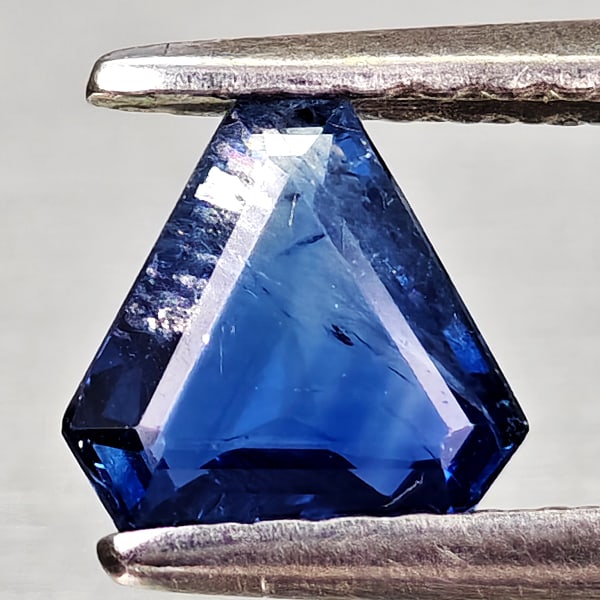 Natural Blue Sapphire Gemstones 0.52 Ct. Fancy Shape 5.9 x 5.7 Mm.: Product ID: 806012104 Product Name: Natural Blue Sapphire Weight: 0.52 CT. Size: 5.9 x 5.7 x 1.9 MM. Shape: Fancy Shape Color: Blue Clarity:VSI Luster: Good Gems Origin: Thailand Treatment: Heated Cry
