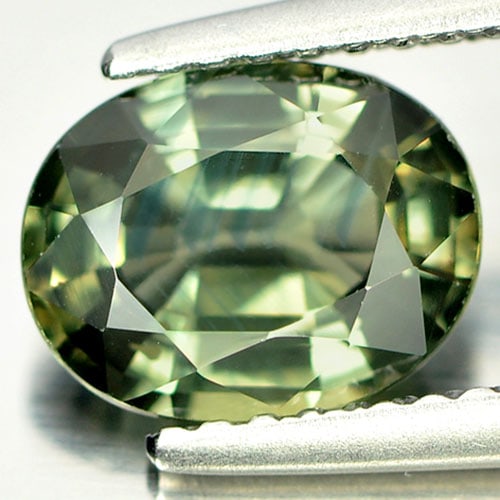 Natural Green Sapphire Gemstones 1.84 Ct. Oval Shape 8.3 x 6.5 Mm.: Product ID: 806131198 Product Name: Natural Green Sapphire Weight: 1.84 CT. Size: 8.3 x 6.5 x 3.9 MM. Shape: Oval Color: Green Clarity:VVS Luster: Very Good Gems Origin: Bangkaja, Thailand Treatment: 