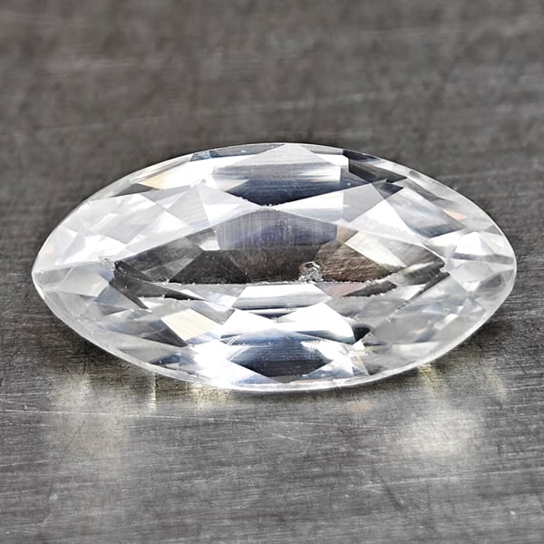 Natural White Zircon Gemstones 0.98 Ct. Marquise Shape 8.2 x 4.3 Mm.: Product ID: 807742901 Product Name: Natural Zircon Weight: 0.98 CT. Size: 8.2 x 4.3 x 2.7 MM. Shape: Marquise Color: White Clarity:VSI Luster: Very Good Gems Origin: Cambodia Treatment: Heated Crystal