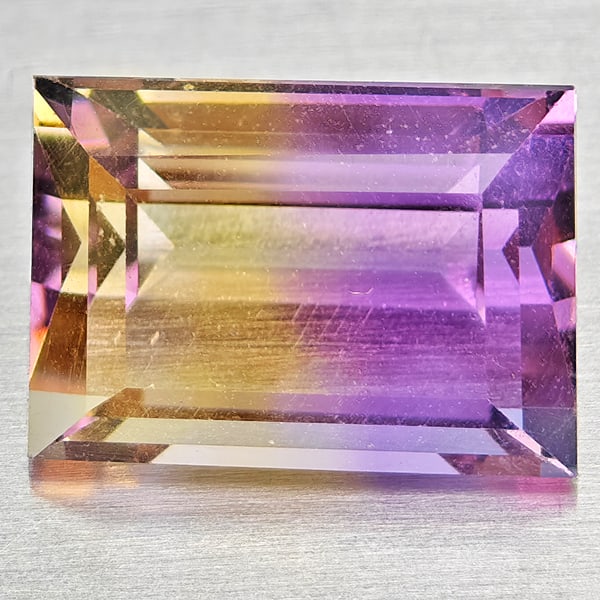 Natural Bi Color Ametrine Gemstones 2.86 Ct. Baguette Shape 10 x 7 Mm.: Product ID: 800408499 Product Name: Natural Ametrine Weight: 2.86 CT. Size: 10 x 7 x 5.4 MM. Shape: Baguette Color: Bi Color Clarity:VSI Luster: Good Gems Origin: Bolivia Treatment: Unheated Crystal S